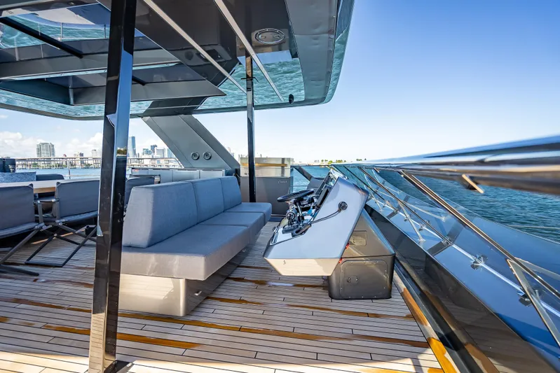 Skip The Wait Yacht Photos Pics Luxurious Sunreef 60 Power yacht deck with modern seating and helm, 2026 model.