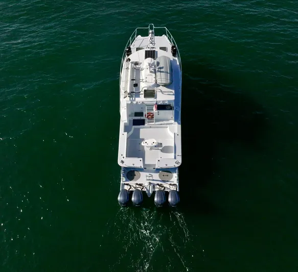Blue Marble Explorer Yacht Photos Pics Aerial view of a 2005 Custom P-38 Lightning Power Catamaran on the water.