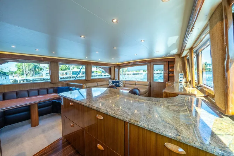 Running Over Yacht Photos Pics Luxurious interior of a 2006 Viking 68 Convertible yacht with elegant wood finishes.