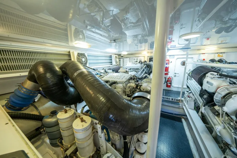 Running Over Yacht Photos Pics Engine room of 2006 Viking 68 Convertible yacht, showcasing machinery and equipment.