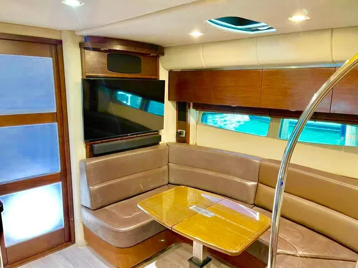  Yacht Photos Pics Luxurious 2010 Chaparral Premiere 400 yacht interior with plush seating and modern amenities.