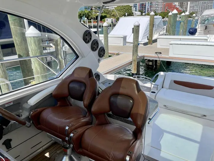  Yacht Photos Pics Interior of 2010 Chaparral Premiere 400 yacht with leather seats at marina.