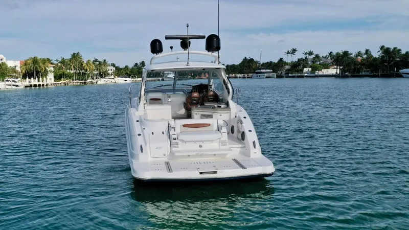  Yacht Photos Pics 2010 Chaparral Premiere 400 yacht on calm water, rear view.