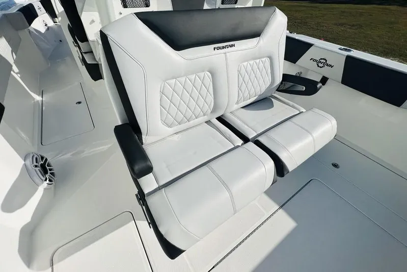  Yacht Photos Pics 2023 Fountain 32 NX boat seating with quilted upholstery and sleek design.