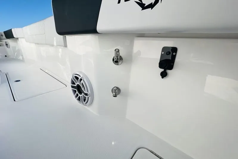  Yacht Photos Pics 2023 Fountain 32 NX boat interior with speaker and fittings, showcasing sleek design.