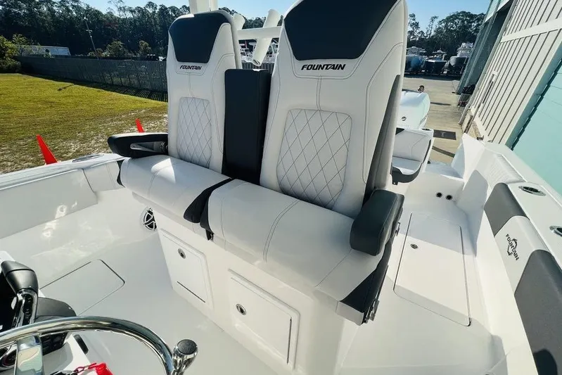  Yacht Photos Pics 2023 Fountain 32 NX boat interior with luxurious seating and modern design.