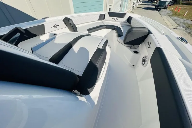  Yacht Photos Pics 2023 Fountain 32 NX boat interior with sleek seating and modern design.