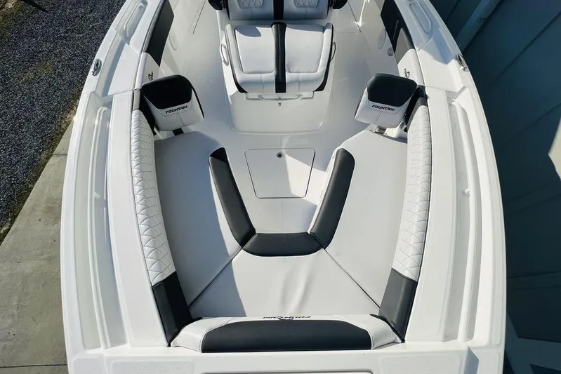  Yacht Photos Pics 2023 Fountain 32 NX boat interior with sleek seating and modern design.