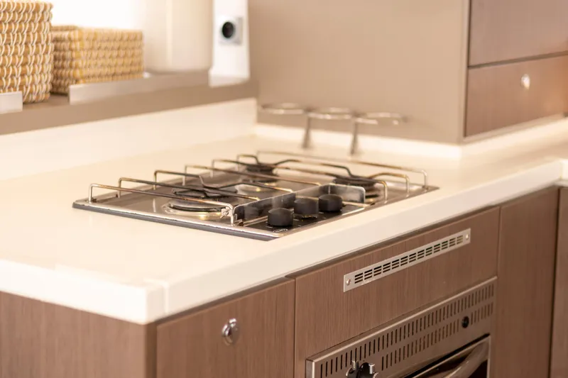 Tatani Yacht Photos Pics Modern kitchen in 2021 Bali 4.8 yacht with sleek stove and cabinetry.