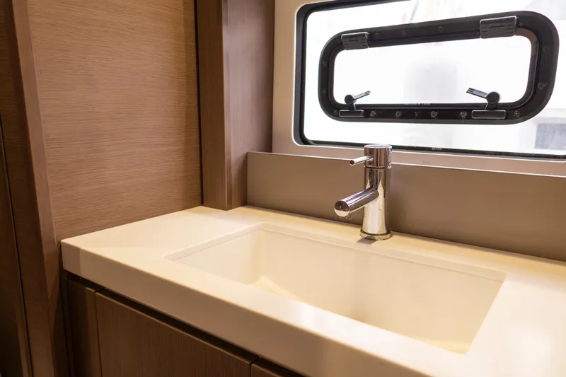Tatani Yacht Photos Pics Modern bathroom sink with chrome faucet in 2021 Bali 4.8 model yacht.