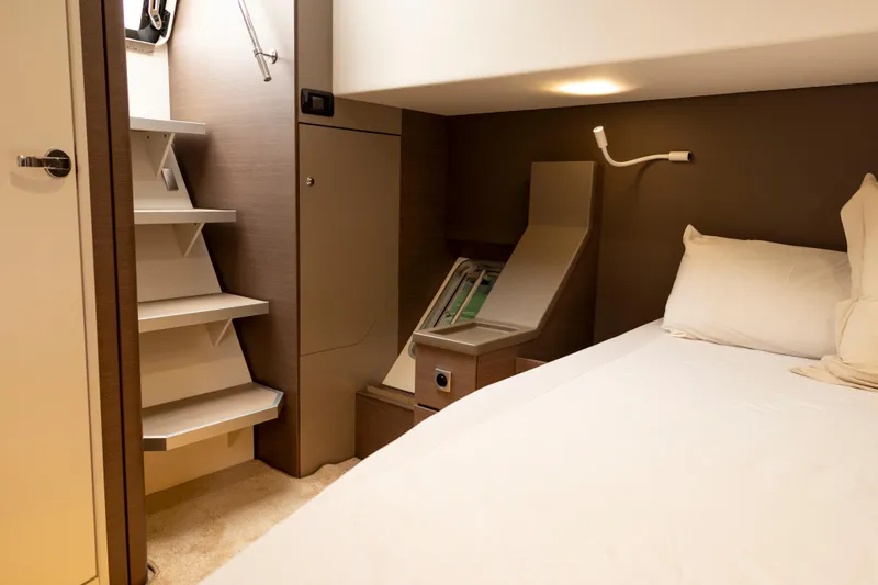 Tatani Yacht Photos Pics Cozy cabin interior of 2021 Bali 4.8 yacht with modern design and comfortable bedding.