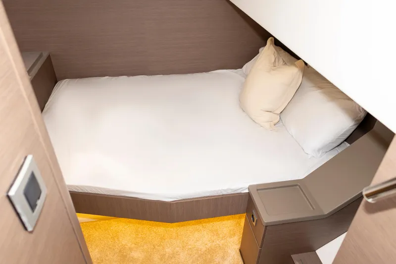 Tatani Yacht Photos Pics Cozy cabin bed in 2021 Bali 4.8 yacht, featuring modern design and soft lighting.