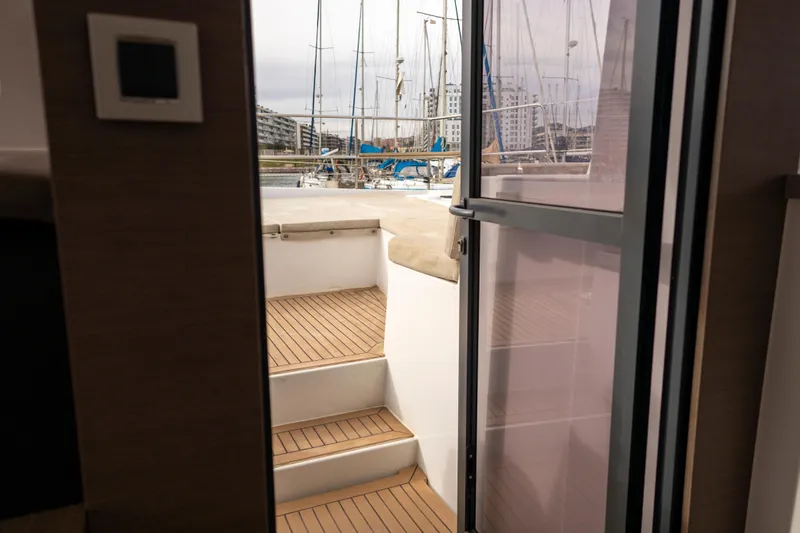 Tatani Yacht Photos Pics View from inside a 2021 Bali 4.8 yacht, showing steps leading to the deck.