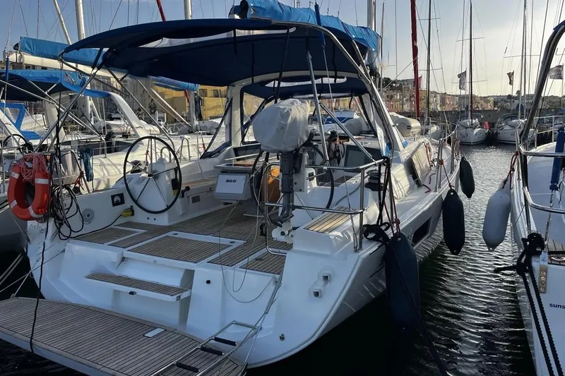  Yacht Photos Pics 2017 Beneteau Oceanis 41.1 sailboat docked in a marina, rear view.