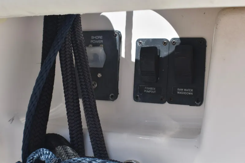 Alipa Yacht Photos Pics Control panel on 2013 Tiara Yachts 3100 Open, featuring shore power and pump switches.