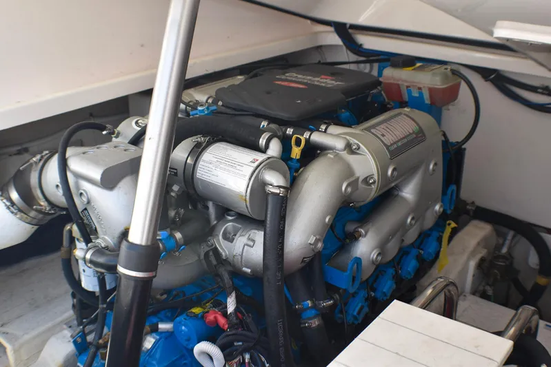 Alipa Yacht Photos Pics Engine compartment of a 2013 Tiara Yachts 3100 Open, showcasing detailed mechanical components.