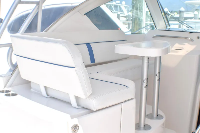 Alipa Yacht Photos Pics 2013 Tiara Yachts 3100 Open interior with white seating and table.