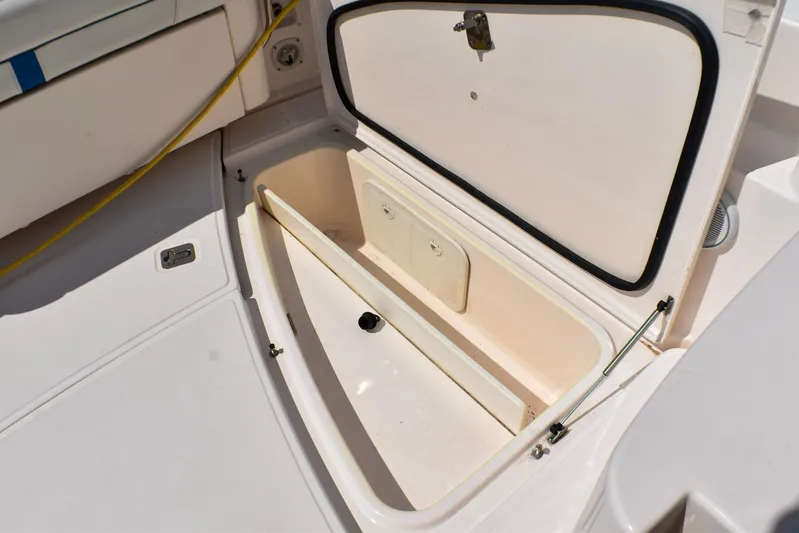 Alipa Yacht Photos Pics Open storage compartment on a 2013 Tiara Yachts 3100 Open boat.