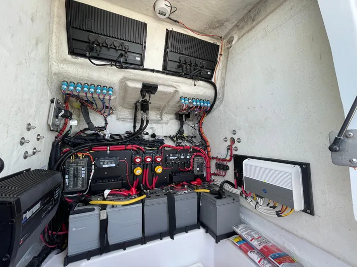 Motivated Yacht Photos Pics Electrical system of 2023 Front Runner 26 Center Console boat, showcasing wiring and components.
