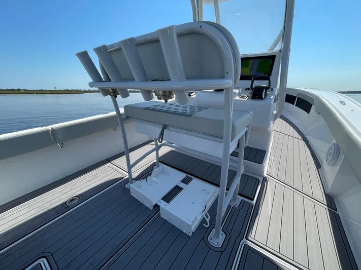 Motivated Yacht Photos Pics 2023 Front Runner 26 Center Console boat interior with sleek seating and modern design.