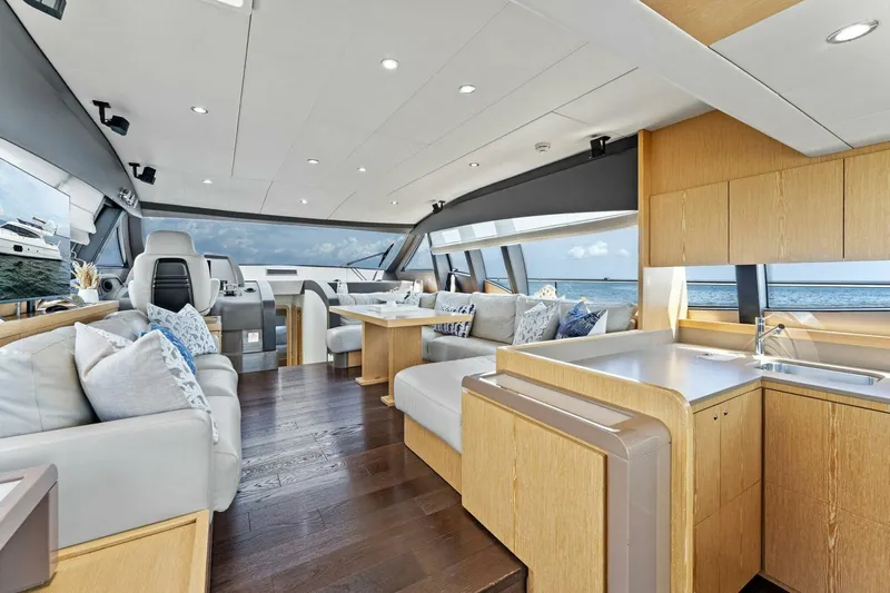 Big Deck Energy Yacht Photos Pics Luxurious interior of 2013 Ferretti Yachts 620 with modern furnishings and ocean view.