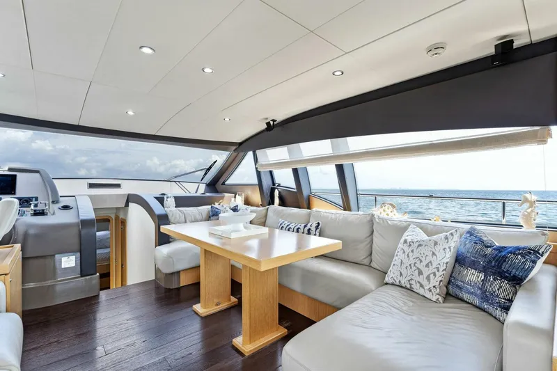 Big Deck Energy Yacht Photos Pics Luxurious interior of 2013 Ferretti Yachts 620 with elegant seating and ocean view.