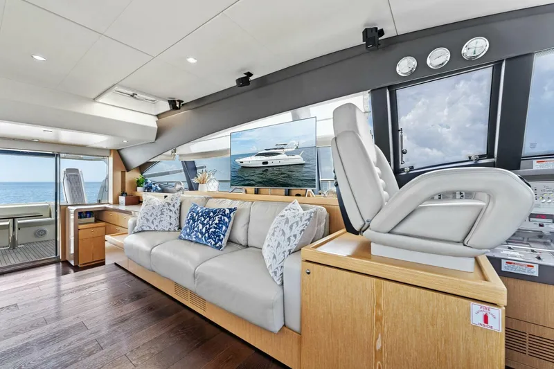 Big Deck Energy Yacht Photos Pics Luxurious interior of 2013 Ferretti Yachts 620 with plush seating and ocean view.