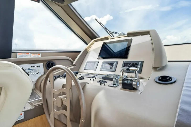 Big Deck Energy Yacht Photos Pics Helm of 2013 Ferretti Yachts 620, featuring modern navigation controls and sleek design.