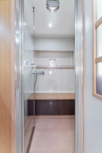 Big Deck Energy Yacht Photos Pics Luxurious bathroom interior on 2013 Ferretti Yachts 620, featuring modern shower design.