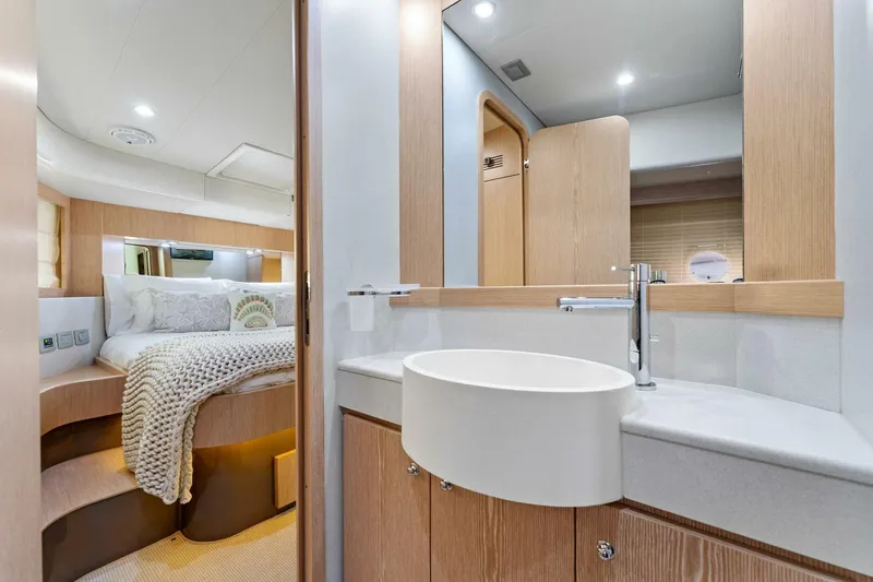 Big Deck Energy Yacht Photos Pics Luxurious Ferretti Yachts 620 interior, featuring a modern bathroom and cozy bedroom, 2013 model.