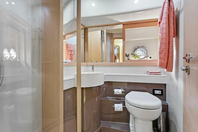 Big Deck Energy Yacht Photos Pics Luxurious bathroom in 2013 Ferretti Yachts 620, featuring modern fixtures and elegant design.