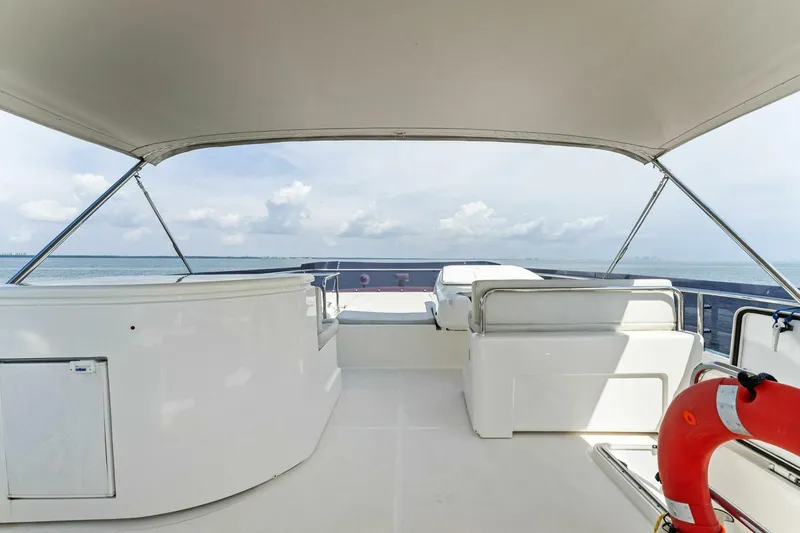 Big Deck Energy Yacht Photos Pics Flybridge of 2013 Ferretti Yachts 620 with seating and ocean view.