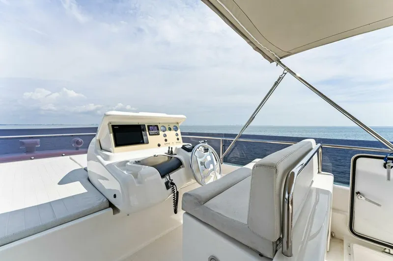 Big Deck Energy Yacht Photos Pics Flybridge of 2013 Ferretti Yachts 620 with ocean view and helm station.