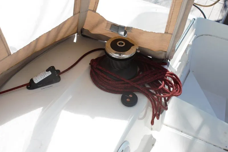 Jungle Goddess Yacht Photos Pics Winch and red rope on 2022 Lagoon 46 catamaran deck.