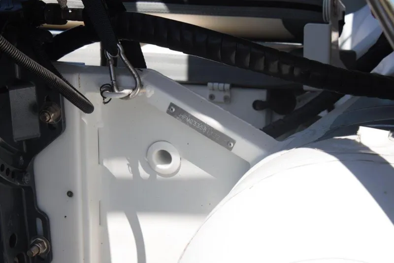 Jungle Goddess Yacht Photos Pics Close-up of a 2022 Lagoon 46 boat's mechanical components and wiring.