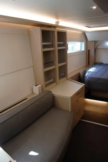 Jungle Goddess Yacht Photos Pics Interior of 2022 Lagoon 46 yacht with modern furnishings and cozy bedroom.