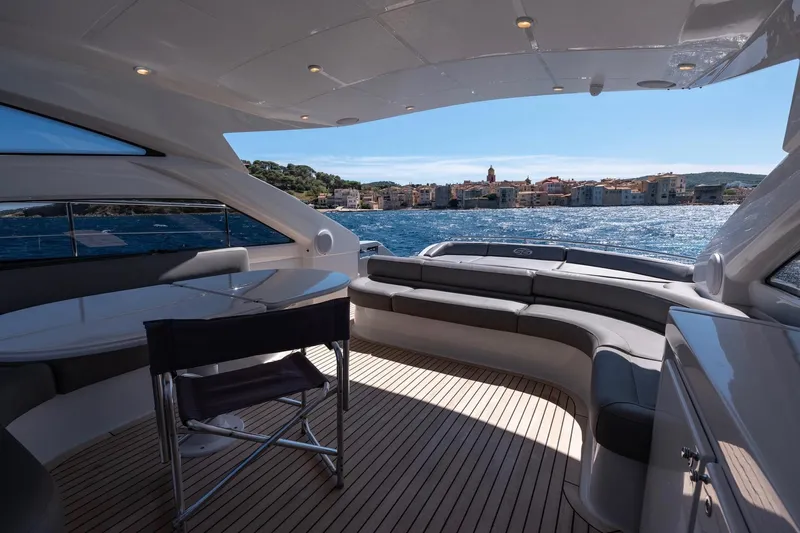  Yacht Photos Pics Luxurious 2006 Pershing 56 yacht interior with scenic ocean view.