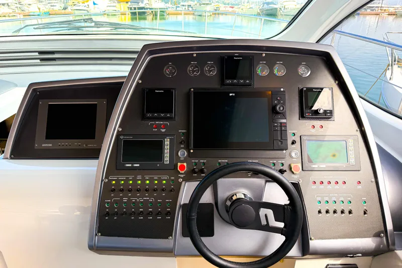  Yacht Photos Pics Control panel of a 2006 Pershing 56 yacht with advanced navigation systems.