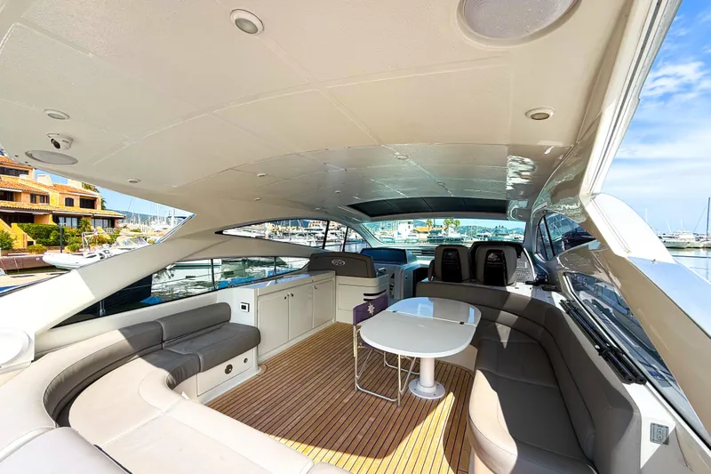  Yacht Photos Pics Luxurious 2006 Pershing 56 yacht interior with elegant seating and modern design.