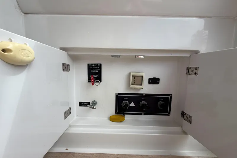  Yacht Photos Pics Control panel inside a 2006 Pershing 56 yacht, featuring switches and dials.