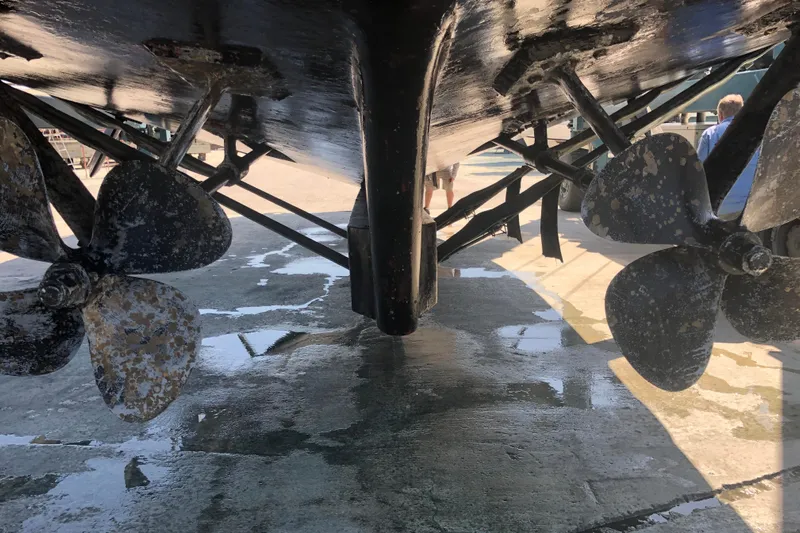 Noelani Yacht Photos Pics Underwater view of 1982 DeFever 52 Offshore Cruiser propellers and rudders.