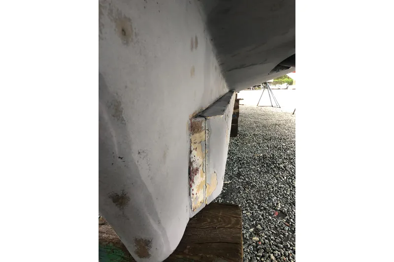 Noelani Yacht Photos Pics 1982 DeFever 52 Offshore Cruiser hull detail, showing wear and surface texture.