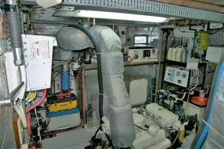 Noelani Yacht Photos Pics Engine room of 1982 DeFever 52 Offshore Cruiser with visible machinery and equipment.
