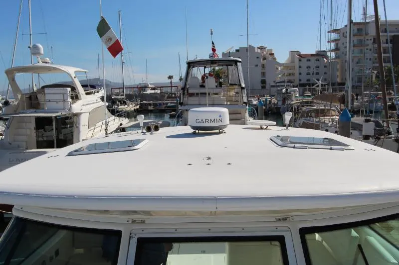  Yacht Photos Pics 2001 Tiara Yachts 3800 Open docked in a marina with Garmin equipment.