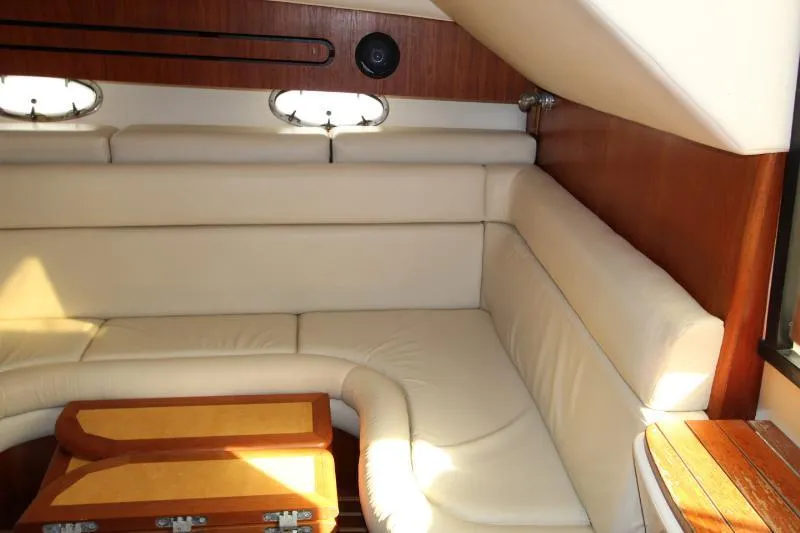  Yacht Photos Pics 2001 Tiara Yachts 3800 Open interior with cream leather seating and wooden accents.