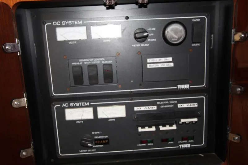  Yacht Photos Pics Electrical control panel of a 2001 Tiara Yachts 3800 Open, featuring DC and AC systems.