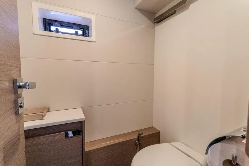  Yacht Photos Pics Bathroom interior of 2022 Fountaine Pajot Samana 59 yacht, featuring modern fixtures.