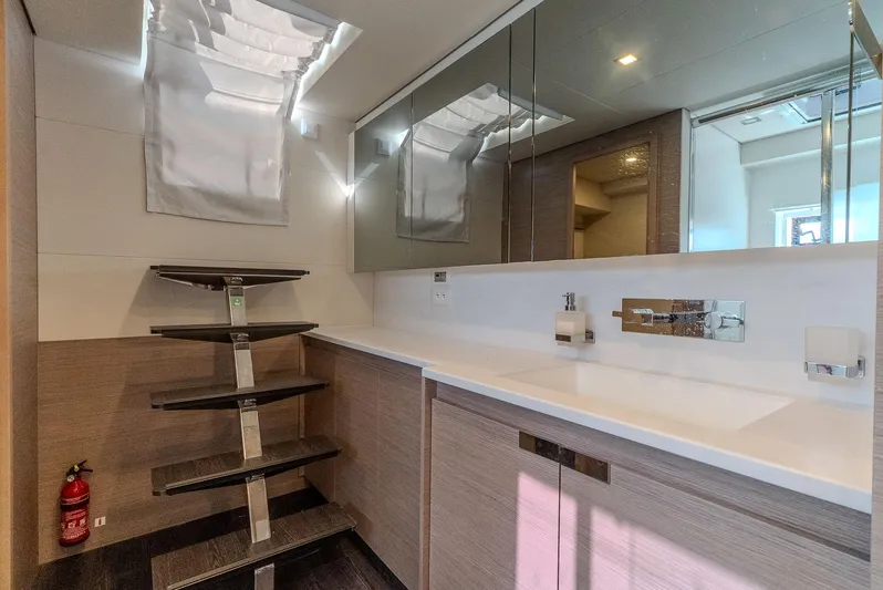  Yacht Photos Pics Modern bathroom interior on 2022 Fountaine Pajot Samana 59 yacht, featuring sleek design and fixtures.