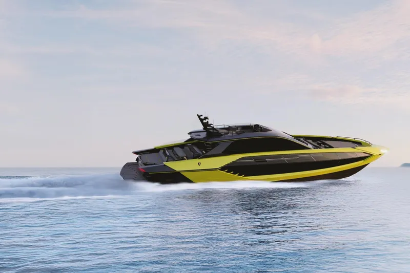  Yacht Photos Pics Futuristic 2027 Tecnomar Lamborghini 101 yacht cruising on open water.