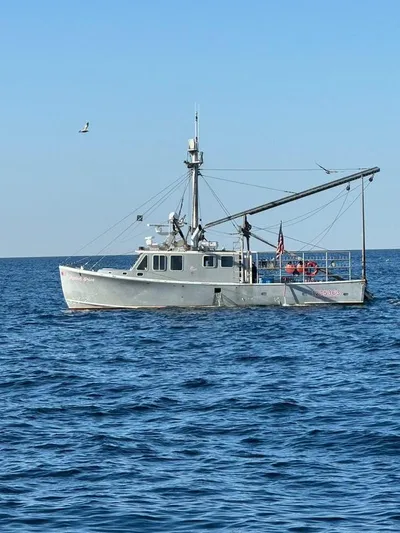  Yacht Photos Pics Wesmac 2015 commercial fishing vessel on open sea under clear blue sky.